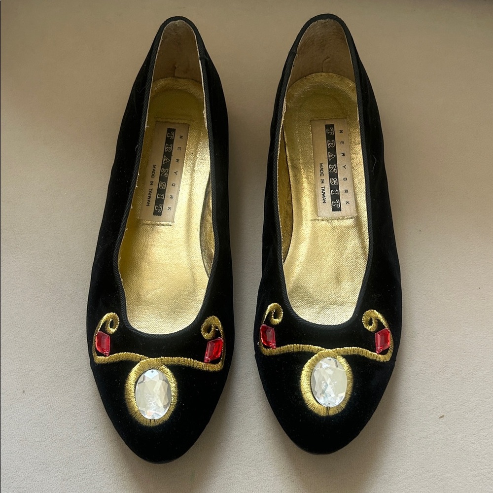 New York Transit Black Flats with Gold and Red Embellishments
